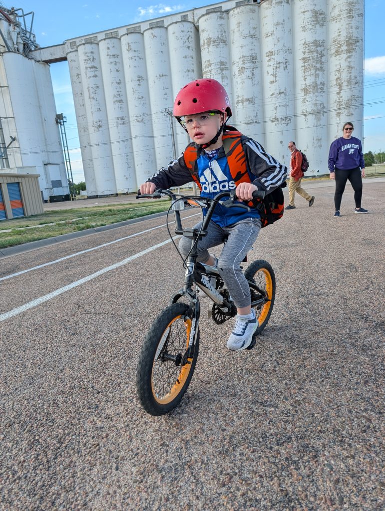 A boy rides his bike to school in Wallace County, Kansas. Source: Lissa Sexson